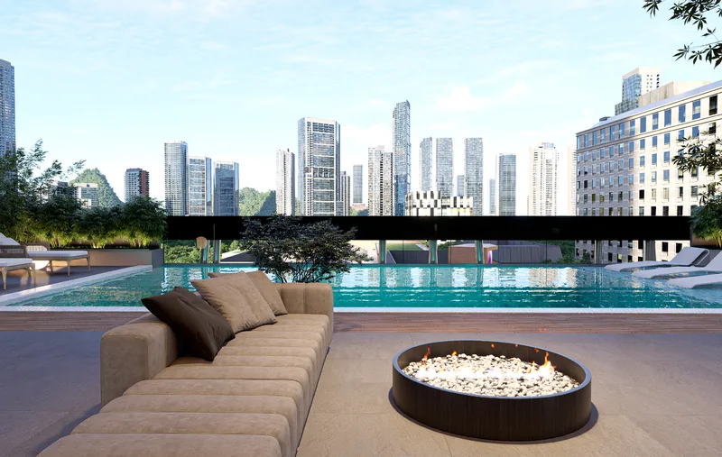 Sala exterior en la terraza de Sky Parc II con vista panorámica a la piscina y al skyline de la ciudad